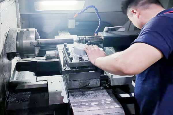 Technician inspecting valve balls